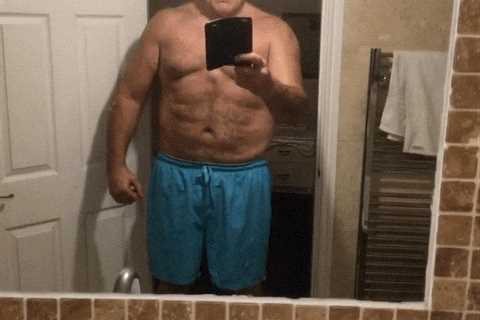 John Fury shows off bulking abs aged 57 in bathroom selfie after training with son Tyson ahead of..
