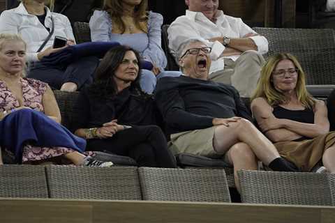 Billionaire Bill Gates yawns at tennis along with actress Elisabeth Shue as Microsoft founder..