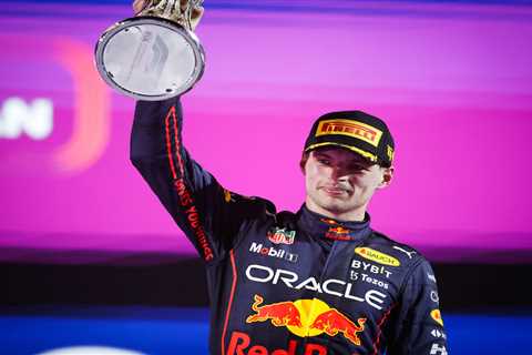 Watch F1 champ Max Verstappen race ONE-HANDED at 200MPH as he tries to remove piece of plastic..