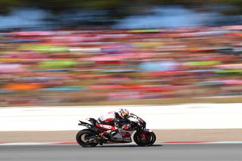 Horror first-corner crash at MotoGP Catalan GP sees rider smash his face into rival’s tyre with..