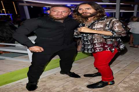 UFC star Conor McGregor hangs out with Jared Leto and holds bottle of Proper No. Twelve whisky at..