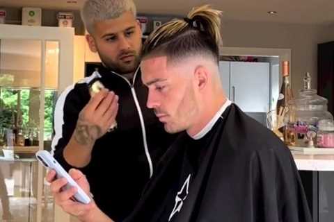 Man City star Jack Grealish shows off new top knot haircut after returning from holidays for..