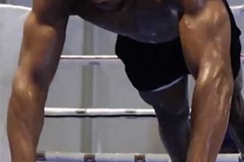 Watch hench Anthony Joshua’s gruelling wrist exercise as he shows off incredible physique in..