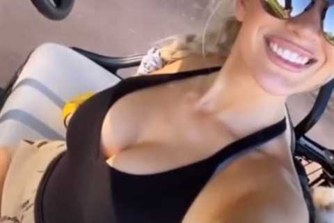 Watch Paige Spiranac stun in very low cut black top as she plays golf ahead of sexy calendar release