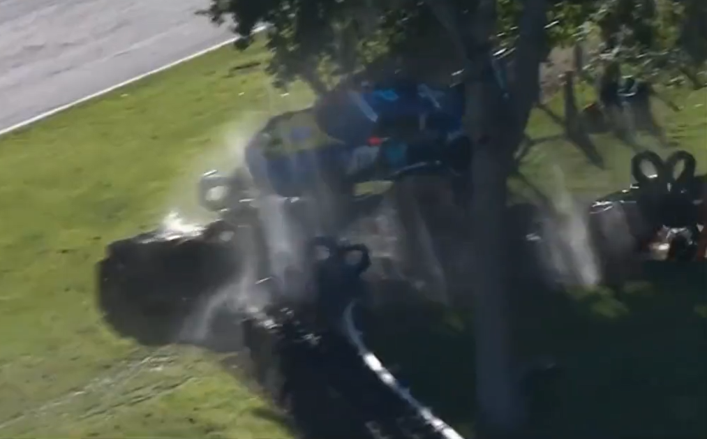 Heart-stopping moment race driver’s £170k Porsche flies through air at 100mph and almost crushes marshal in huge crash