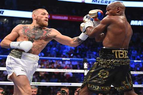 Conor McGregor offered boxing world title shot by fellow Irish fighter Dennis Hogan as talks begin..