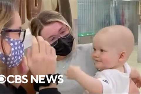 Aunt and nephew meet for first time at airport