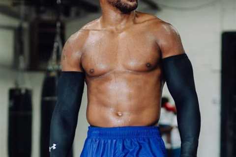 Anthony Joshua shows off hulking body as he bulks up in gym during training for Jermaine Franklin..