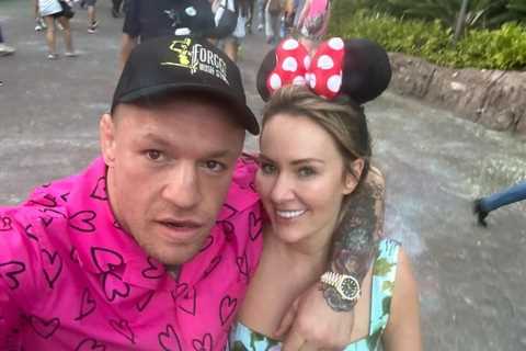 Dee Devlin in loved-up snaps with Conor McGregor as they visit Disneyworld with their children