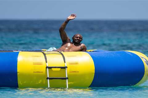 Arsenal legend Patrick Vieira shows off belly tattoo as he relaxes in Barbados amid talk of return..