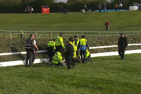 Grand National DELAYED as protesters try to storm track amid huge police presence