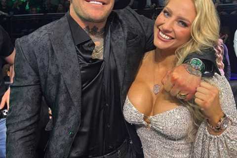 Ebanie Bridges stuns in low cut dress as she gets up close and personal with Conor McGregor at..