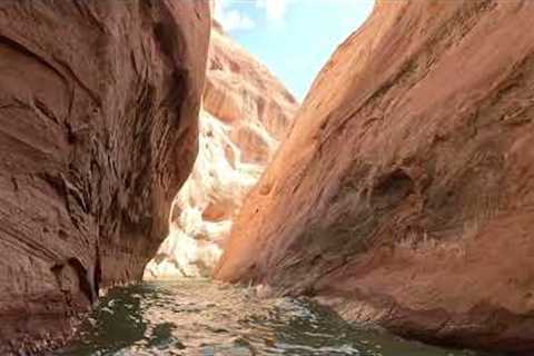 jet skiing seadoo through lake powell slot canyons