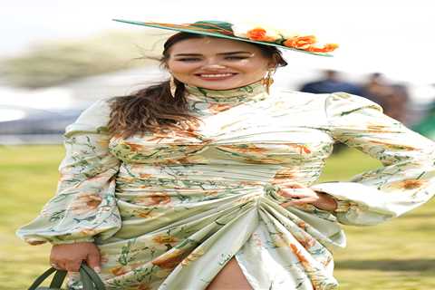 Glam racegoers pull out all the style stops as they arrive for Derby Day at Epsom Downs racecourse