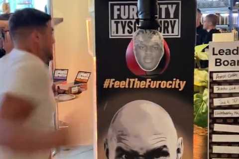 Tommy Fury Takes a Swing at KSI's Face on Punch Machine at Furocity Event