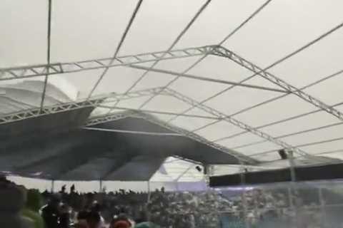 Brazil GP grandstand COLLAPSES with fans forced to flee after biblical storm wreaks havoc on F1..