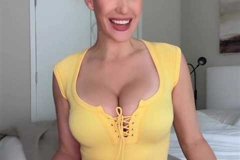 Paige Spiranac threatens to bust out of low-cut top with only string to stop her and says ‘I’m..