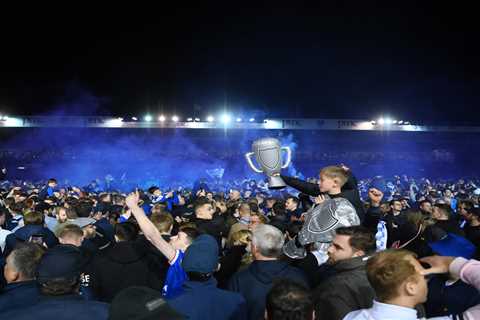 Portsmouth Fans Storm Pitch as Club Returns to Championship After 12 Years