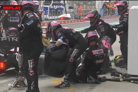 Formula One mechanic knocked to the floor in pit stop blunder