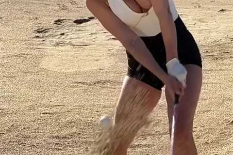 Paige Spiranac risks wardrobe malfunction with ‘provocative’ slo-mo swing video in extremely..