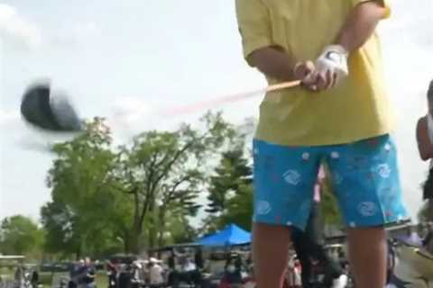 ‘Living legend’, say fans as Hooters-loving wild man of golf John Daly tees off glamorous woman’s..