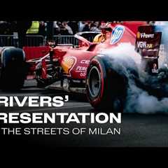 Lewis and Charles driving TOGETHER on the streets of Milan
