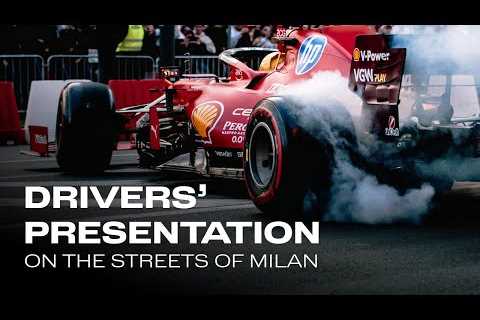 Lewis and Charles driving TOGETHER on the streets of Milan
